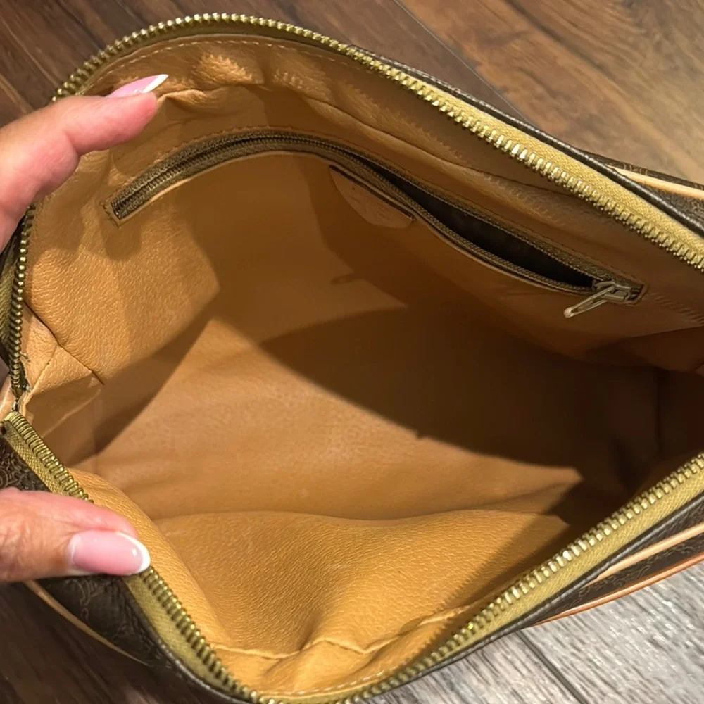 Celine Pre Owned Authentic Brown and Tan Toiletry Bag with Monogram Pattern.